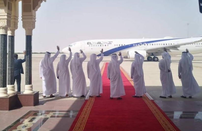 United Arab Emirates delegates wave to the departing El Al plane at the end of IsraelUAE normalization talks in Abu Dhabi on September 1 (credit: EL AL)