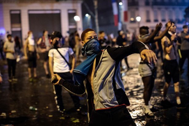 Fans-Celebrate-The-Outcome-Of-The-World-Cup-Final-Between-France-And-Croatia.jpg