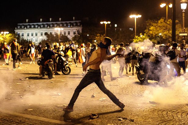 Fans-Celebrate-The-Outcome-Of-The-World-Cup-Final-Between-France-And-Croatia.jpg