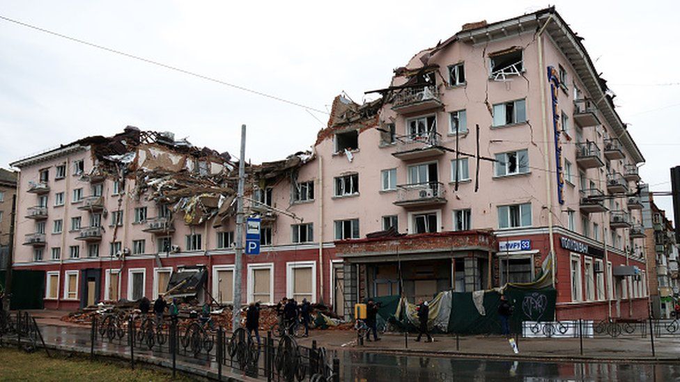 The building of the Hotel Ukraine shows damage caused by Russian shelling in Chernihiv, northern Ukraine.